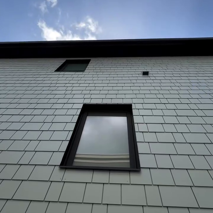 Shingle siding detail around a window